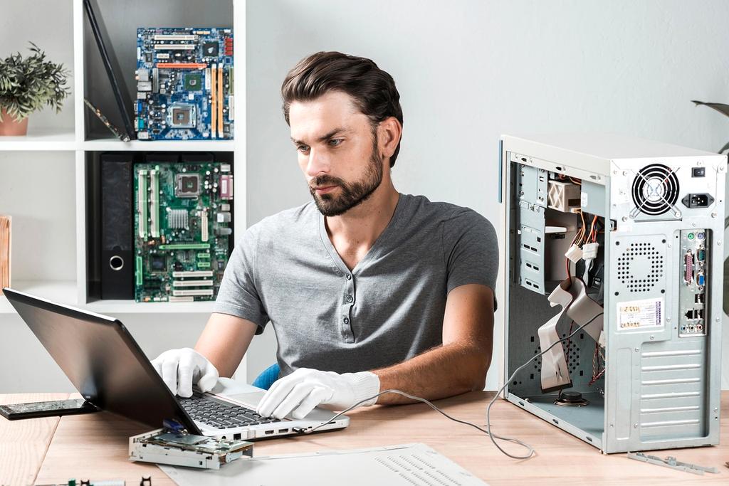 Professional computer service team working on devices