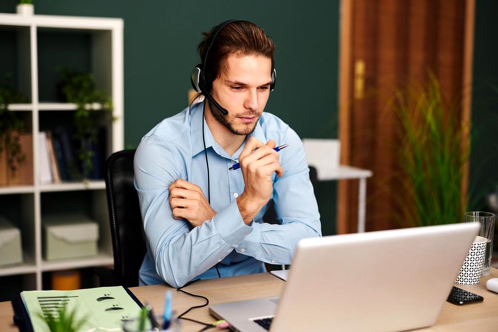 Contact support workspace with phone and computer