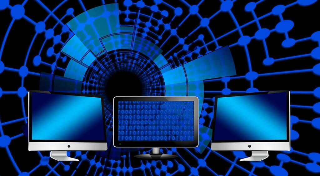 Technician recovering data from hard drive